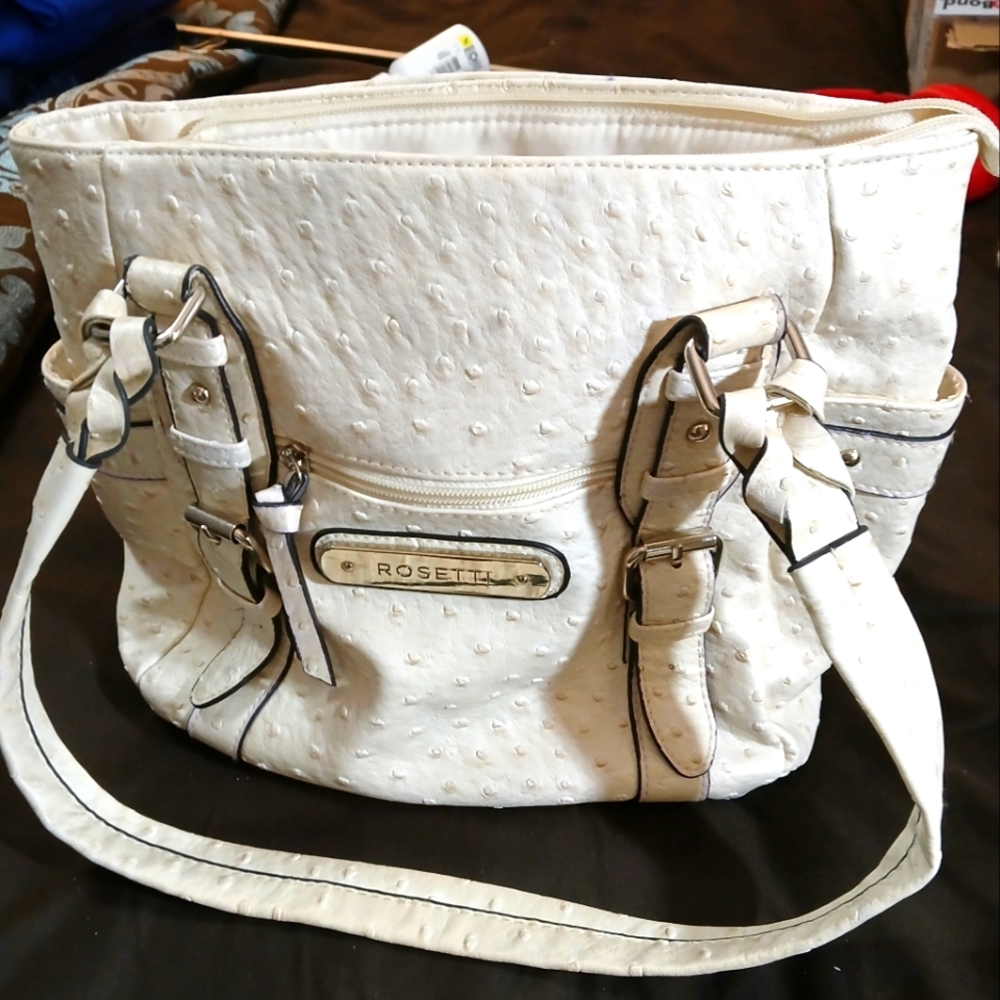 Pe-loved Rosetti Women's Faux Peacock Leather Cream Colored Purse.